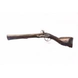 A flintlock blunderbuss, early 19th century, with full walnut stock, carved and inlaid with brass