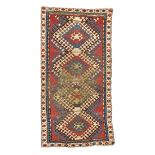 Caucasian-Kazak-rug  around 1850, ghiordes-knot, worn, damaged, incomplete, repaired, 195*100