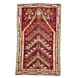 Anatolian-Kirsehir-prayer rug  around 1890, ghiordes-knot, worn, incomplete at the ends, 163*100 cm