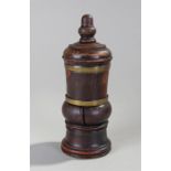 George III lignum vitae coffee grinder, with a turned knob above a baluster body, two brass