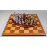 Unusual one off chess set, made for the visually impaired, made from aluminium and brass, on a