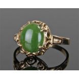 9 carat gold and jade set ring, with the oval jade stone set in 9 carat gold mount, ring size P