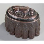 Unusual 19th Century jelly mould, with bison decoration to the top above a geometric designed