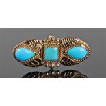 14 carat gold turquoise set brooch, by D Benally, the central square turquoise flanked by a