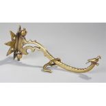 19th Century brass chimney crane, with star wall mount arched bracket arm with bird finial,