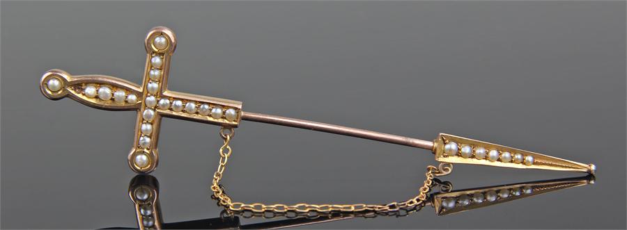 9 carat gold and pearl set stick pin, modelled as a sword, with pearls set the to the hilt and