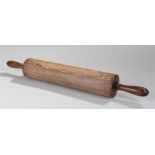 19th Century ash rolling pin, with shaped handles and cylinder roller, 60cm long