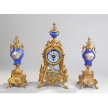 Late 19th Century French gilt spelter and porcelain mantel clock, the clock with a blue glaze urn