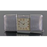 Movado ermeto silver purse watch, retailed by Kirby, Beard & Co, Paris, numbered 1200235, silver