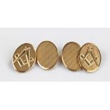 Pair of 9 carat gold masonic cufflinks, oval form with masonic device, 9 grams