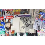Collection of Beatles ephemera, to include singles, the white album, newspaper cuttings,