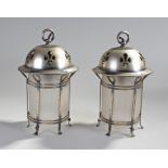 Pair of Arts and Crafts hanging lanterns, with fle