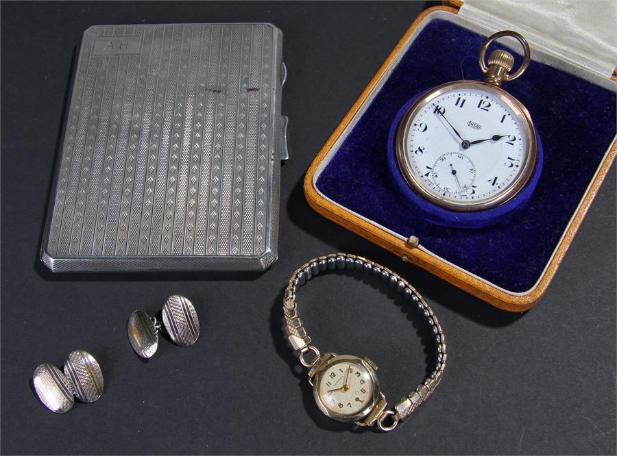 Gold plated open face pocket watch, housed within