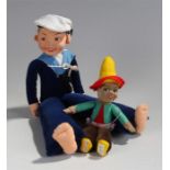 Norah Wellings, two stuffed toys, a sailor and a c