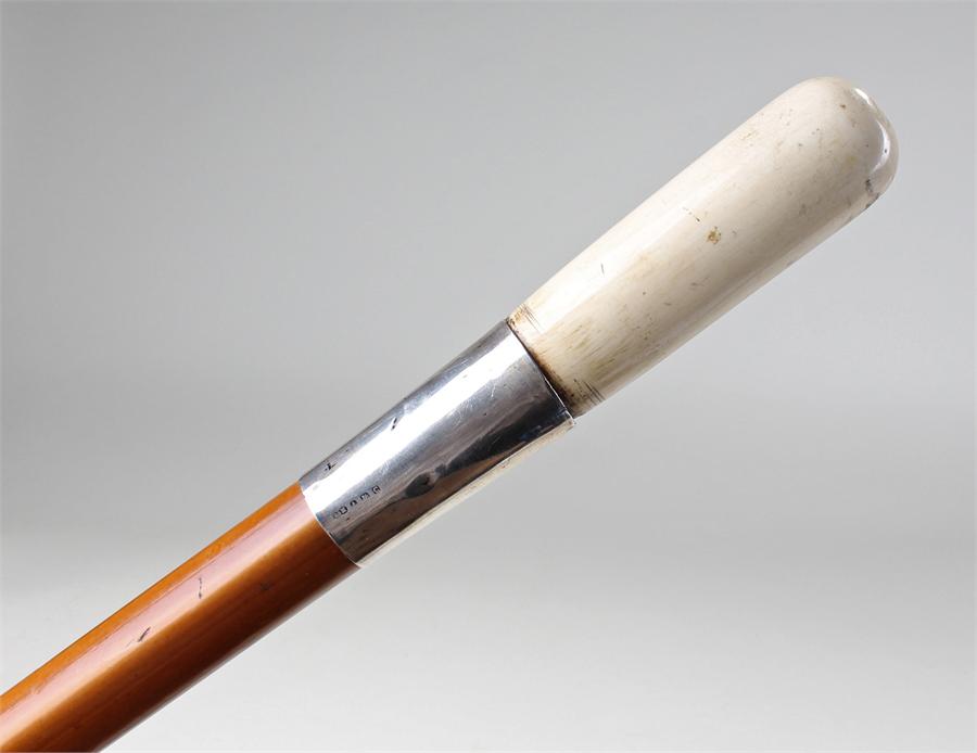 Victorian ivory topped walking cane, the ivory top