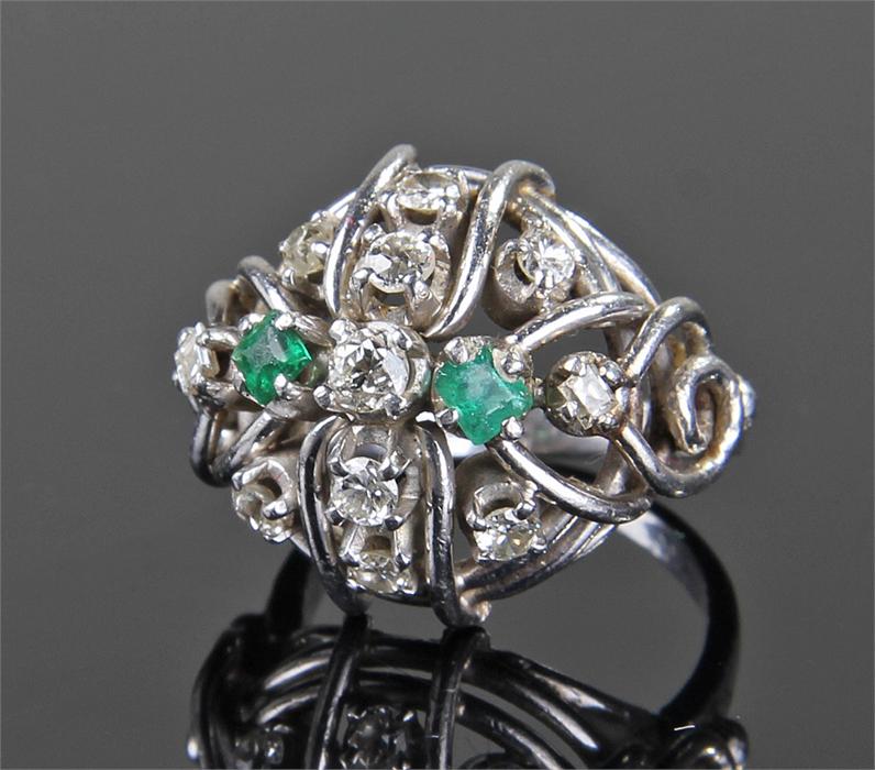 White metal diamond and emerald set ring, the band