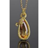 Yellow diamond and topaz snake necklace, the snake