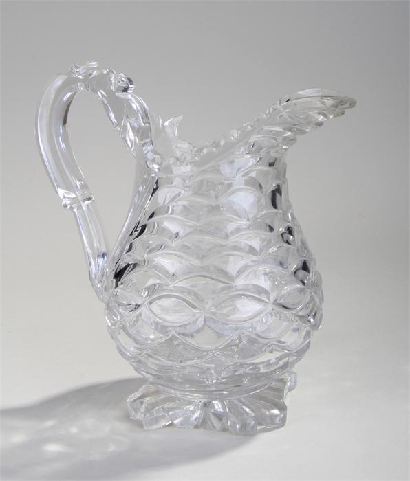 Early 19th Century glass water jug, in the form of