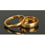 Two gold wedding bands, the first marked for 22 ca