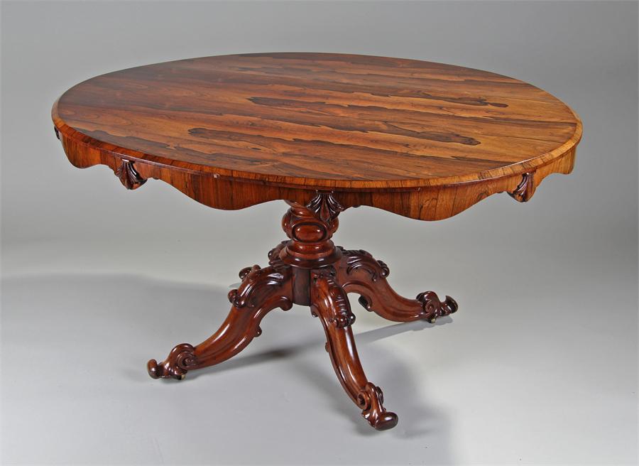 Victorian rosewood breakfast table, the figural ov