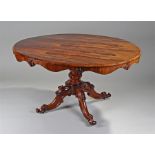 Victorian rosewood breakfast table, the figural ov