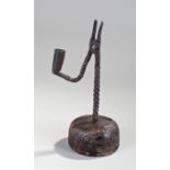 Iron and chestnut rush light holder, of typical fo