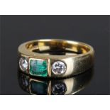 18 carat gold emerald and diamond set ring, the ce