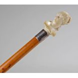 Ivory carved Dandy cane, the ivory top carved in t