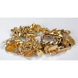 Heavy gold charm bracelet, the 18 carat gold chain