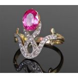 Yellow metal ruby and diamond ring, the oval appro