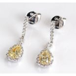 Pair of yellow diamond drop earrings, each at 0.49