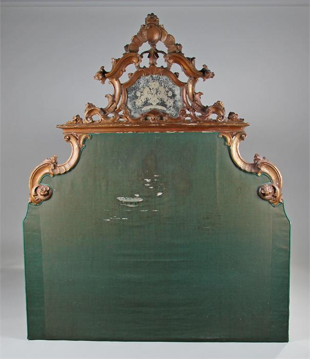19th Century bed head, with a gilt gesso crest wit