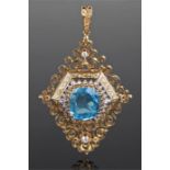 Yellow metal diamond and topaz set pendant, with a