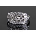 18 carat white gold diamond set ring, with three b