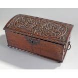 Mid 18th Century oak casket, the foliate swag carv