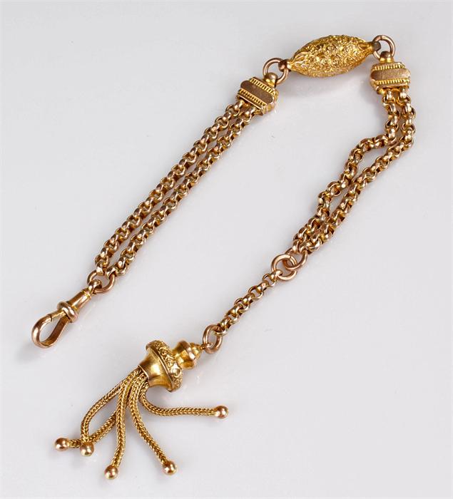 Yellow metal ladies watch chain, probably gold plated, two chain links held with a oval bead,