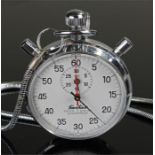 Hanhart chrome stopwatch, with a white dial, Arabic hours, together with a watch chain, (2)