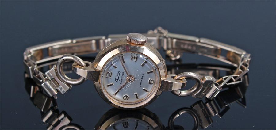 Cadola ladies 18 carat gold wristwatch, the signed champagne dial, Arabic hours, 9 carat gold strap