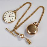 Pocket watch, chain and gold plated sovereign case, the watch by Sekonda, on a gold plated chain and