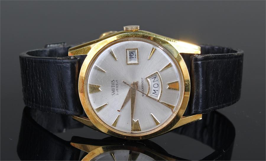 Smiths gold plated gentleman's wristwatch, the silvered dial with arrow hour makers, date and day