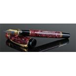 Parker fountain pen, red marble effect, 18 carat gold nib