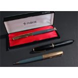 Parker fountain pen, cased, together with a matching pencil, also with another fountain pen