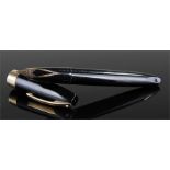 Sheaffer's black fountain pen with gold coloured band around the lid, 14 carat gold nib