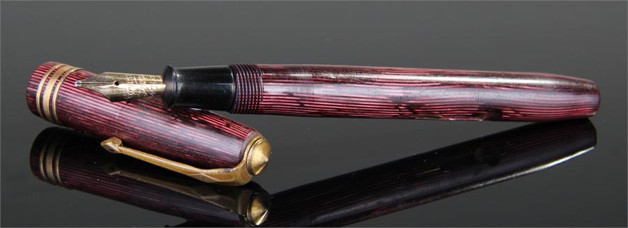 Conway Stewart fountain pen, red marble effect, 14 carat gold nib