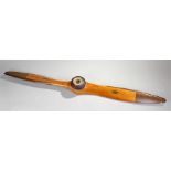 Fine laminated mahogany two-blade propeller with rivetted brass leading edge and tips, by