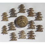 Set of 19th Century livery buttons, of a boar chained to a tree, to include twelve buttons and on