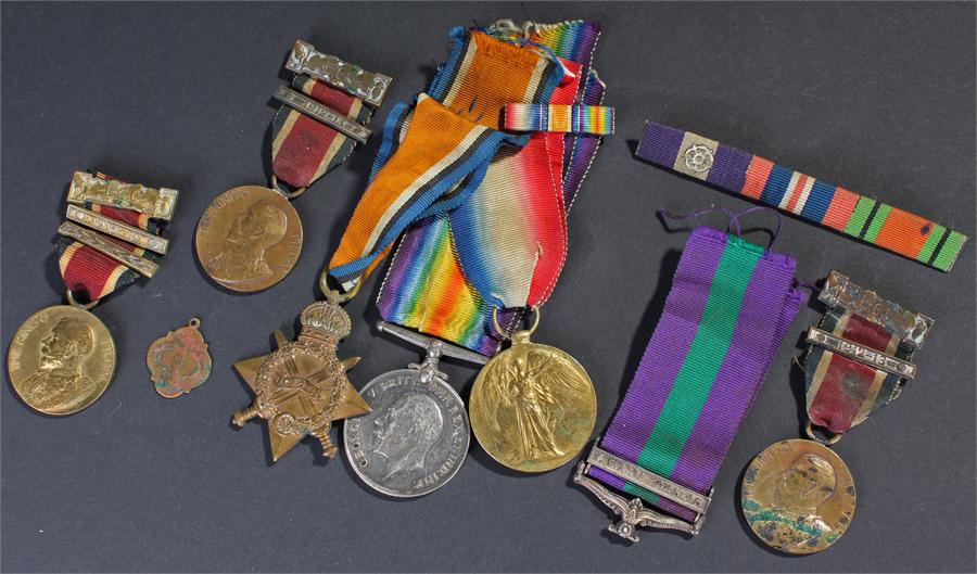 First War trio, awarded to 54757 GNR. A.J. MALLOWS. R.F.A. together with three attendance medals and
