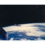 The Agena Target Docking Vehicle over the Earth The Agena Target Docking Vehicle (ATDA) over the