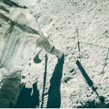 Charles Duke - John Young kneeling to get a rock at Station 6, EVA 2, Apollo 16, April 1972