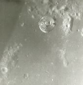 The CSM “Charlie Brown” in lunar orbit while the LM “Snoopy” approaches the Moon, Apollo 10, May